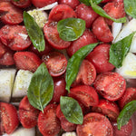 Close up of fresh sweet pink tomatoes showing natural color and premium quality