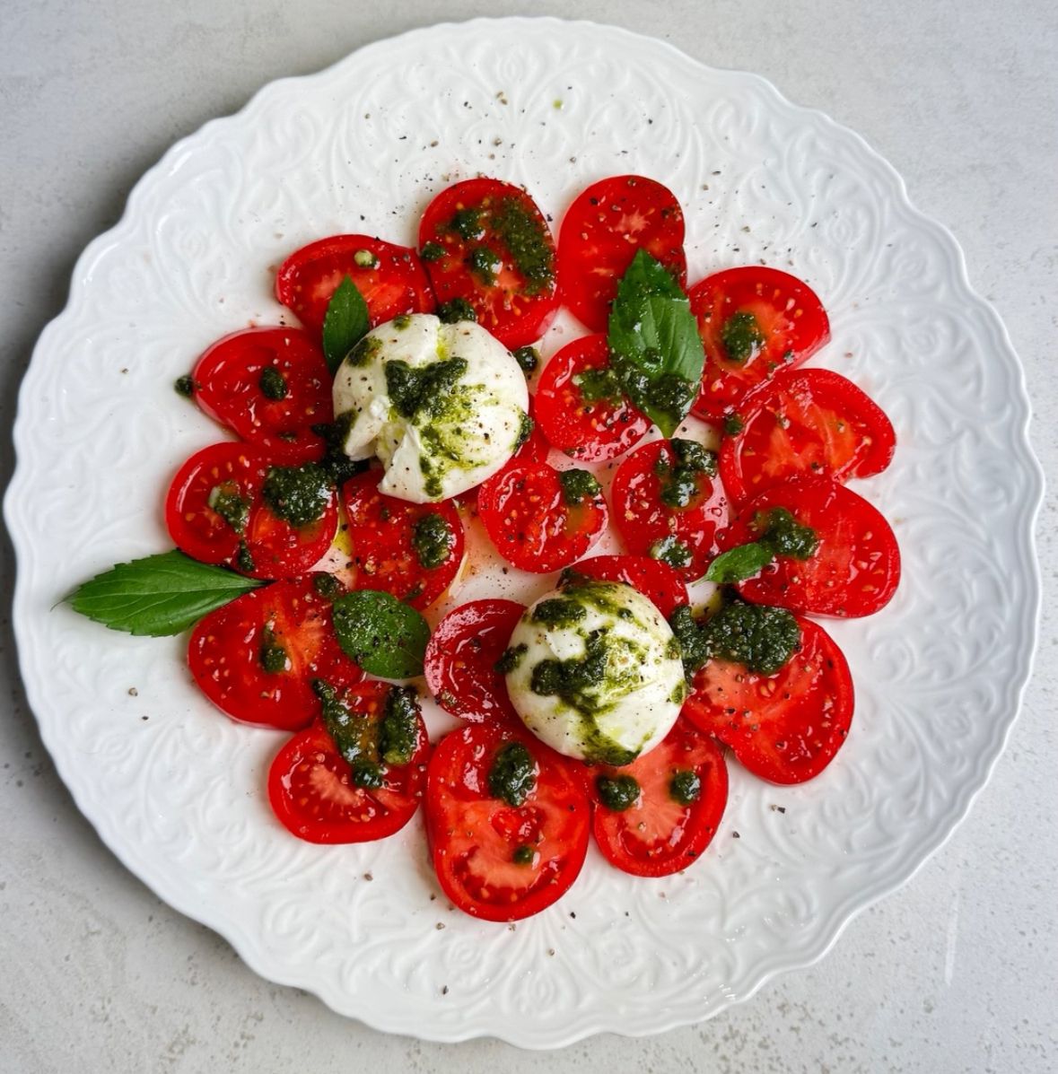 Premium caprese salad with pink tomatoes